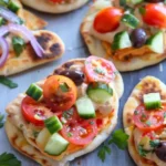 Greek Salad Naan Bites with Hummus