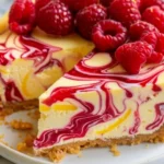 Luscious Lemon Raspberry Swirl Cheesecake
